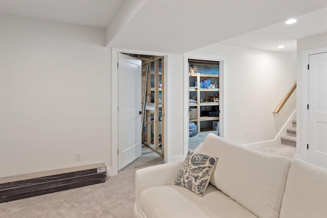 6581 Timpson Ave SE, Alto, MI 49302 - living room with carpet flooring, recessed lighting, and stairway