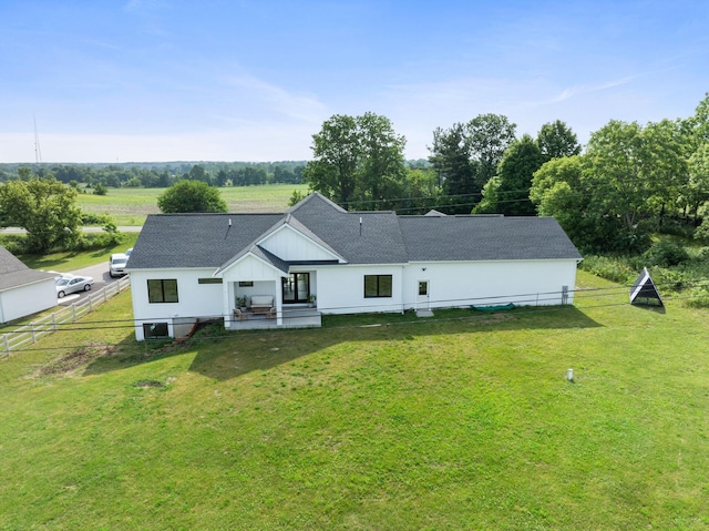 6581 Timpson Ave SE, Alto, MI 49302 - view of front facade with board and batten siding and roof with shingles