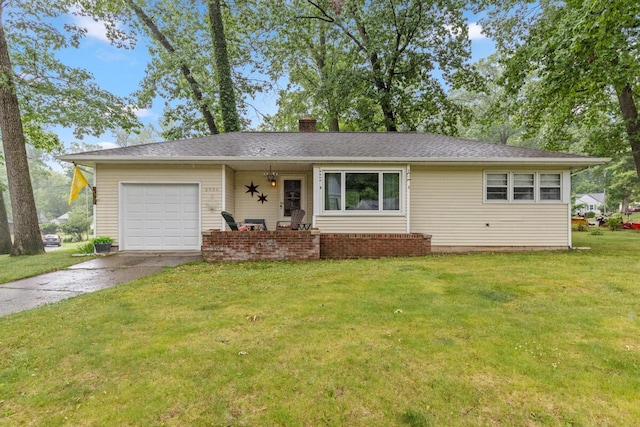 2925 Dawes Ave SE, Grand Rapids, MI 49508 - ranch-style home featuring driveway, an attached garage, a front yard, and a chimney