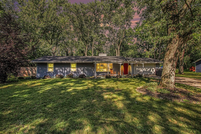 3365 Circle Dr, Saint Joseph, MI 49085 - view of front of property featuring covered porch, an attached garage, and driveway