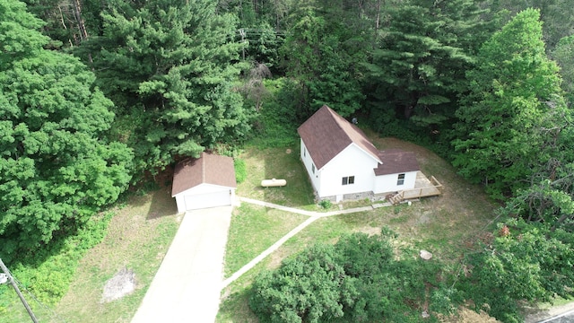 17324 11 Mile Rd, Leroy, MI 49655 - aerial overview of property's location with a heavily wooded area