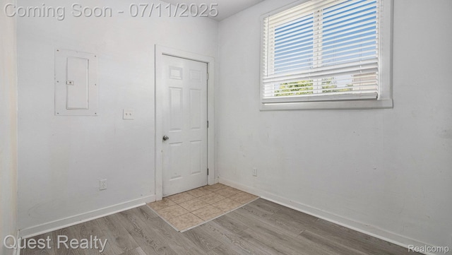 21005 Westview Ave, Ferndale, MI 48220 - spare room featuring electric panel and wood finished floors