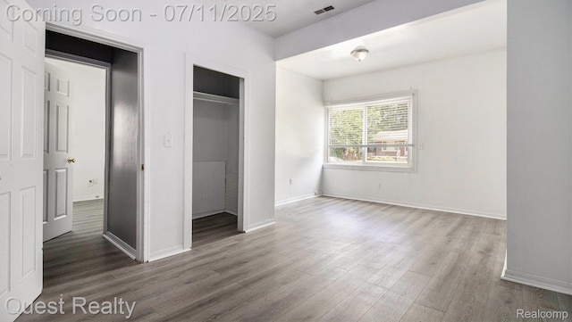21005 Westview Ave, Ferndale, MI 48220 - unfurnished bedroom featuring wood finished floors and a closet