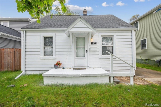 1771 E George Ave, Hazel Park, MI 48030 - bungalow-style home with roof with shingles and a chimney
