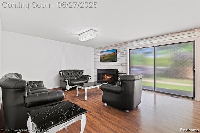 29284 Wellington Rd W, Southfield, MI 48034 - living room with a fireplace and wood finished floors