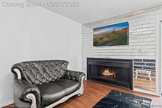 29284 Wellington Rd W, Southfield, MI 48034 - living area featuring wood finished floors and a fireplace