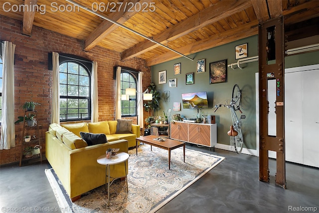 6533 E Jefferson Ave Unit 312W, Detroit, MI 48207 - living room with a wooden ceiling with exposed beams, finished concrete floors, and brick wall