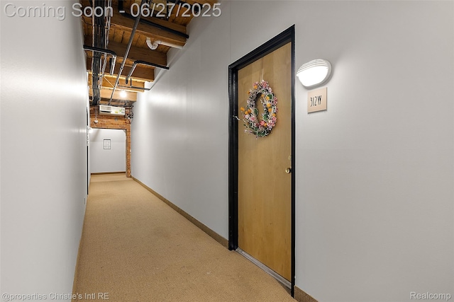 6533 E Jefferson Ave Unit 312W, Detroit, MI 48207 - hall with carpet floors and beam ceiling