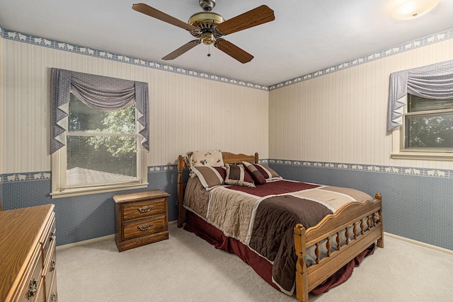 4650 Rollridge Ave, Kalamazoo, MI 49004 - bedroom featuring wallpapered walls, carpet flooring, and ceiling fan