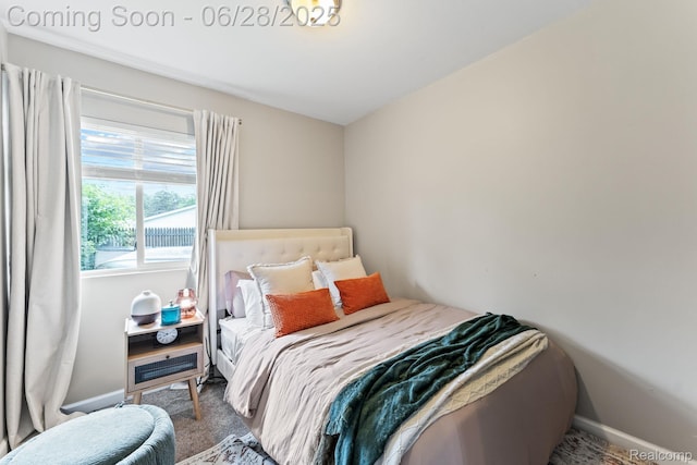 4860 Lindholm Dr, White Lake, MI 48383 - bedroom featuring carpet and baseboards
