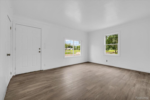 19966 Lindsay St, Detroit, MI 48235 - unfurnished room featuring dark wood finished floors and baseboards
