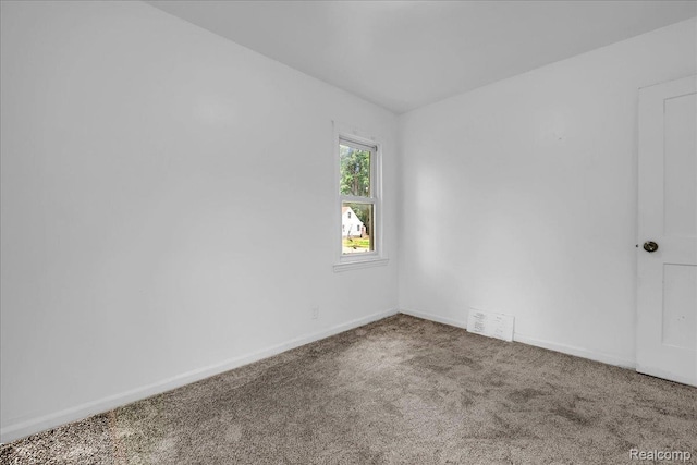 19966 Lindsay St, Detroit, MI 48235 - carpeted spare room featuring baseboards