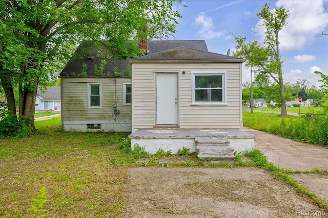 19966 Lindsay St, Detroit, MI 48235 - back of property featuring a chimney