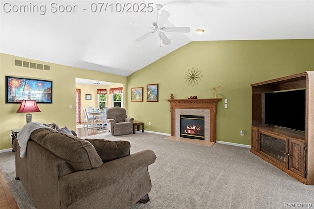 12366 Orchard Wood Dr, Fenton, MI 48430 - living area with ceiling fan, a high end fireplace, high vaulted ceiling, and carpet flooring