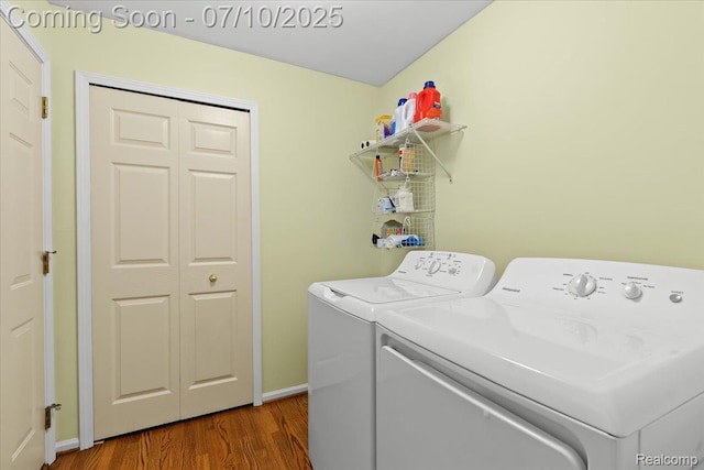 12366 Orchard Wood Dr, Fenton, MI 48430 - washroom featuring separate washer and dryer and dark wood-style floors