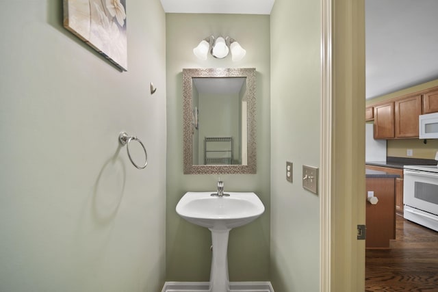 662 Village Ln, Milford, MI 48381 - bathroom featuring wood finished floors