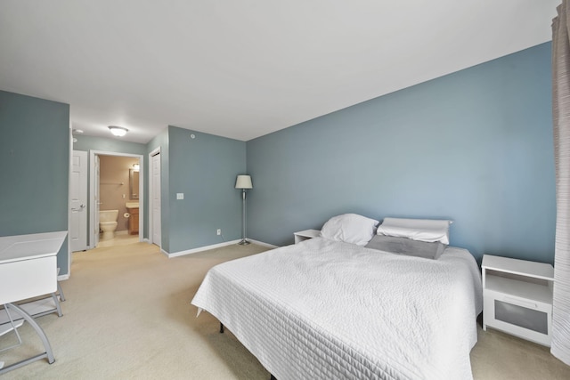 662 Village Ln, Milford, MI 48381 - bedroom with carpet flooring and ensuite bath