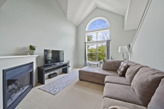 662 Village Ln, Milford, MI 48381 - carpeted living room featuring a fireplace and high vaulted ceiling