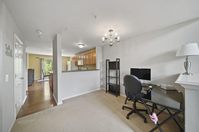 662 Village Ln, Milford, MI 48381 - office area with light colored carpet and a chandelier