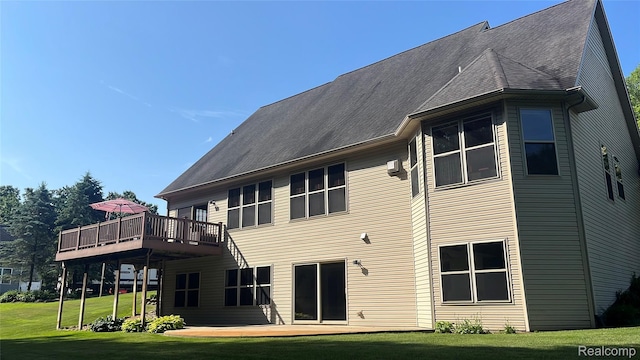 5580 Birch Ln, Davisburg, MI 48350 - rear view of property with a deck, a lawn, a patio, and a shingled roof