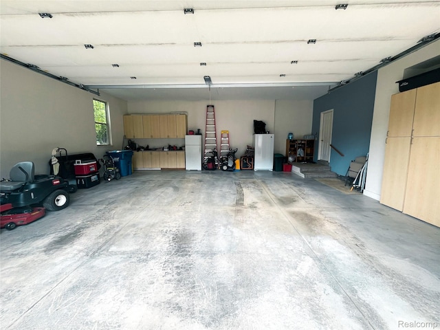 5580 Birch Ln, Davisburg, MI 48350 - garage with freestanding refrigerator