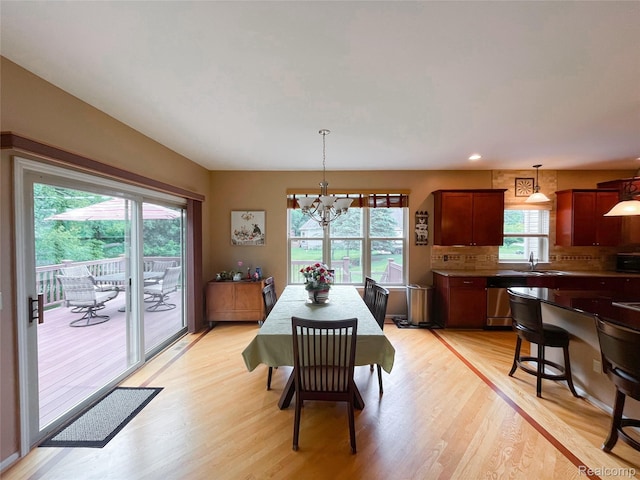 5580 Birch Ln, Davisburg, MI 48350 - dining area with a chandelier, light wood finished floors, and recessed lighting