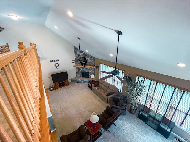 5580 Birch Ln, Davisburg, MI 48350 - living room featuring carpet, a fireplace, high vaulted ceiling, and recessed lighting