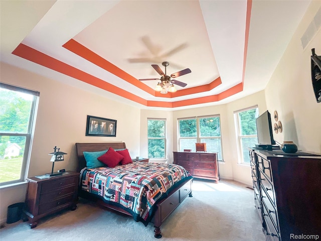 5580 Birch Ln, Davisburg, MI 48350 - carpeted bedroom featuring a raised ceiling and ceiling fan