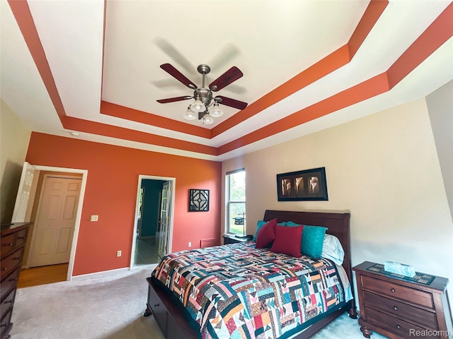 5580 Birch Ln, Davisburg, MI 48350 - bedroom with a raised ceiling, carpet, and a ceiling fan