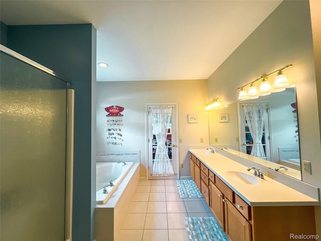 5580 Birch Ln, Davisburg, MI 48350 - full bathroom with double vanity, a bath, tile patterned flooring, and a stall shower