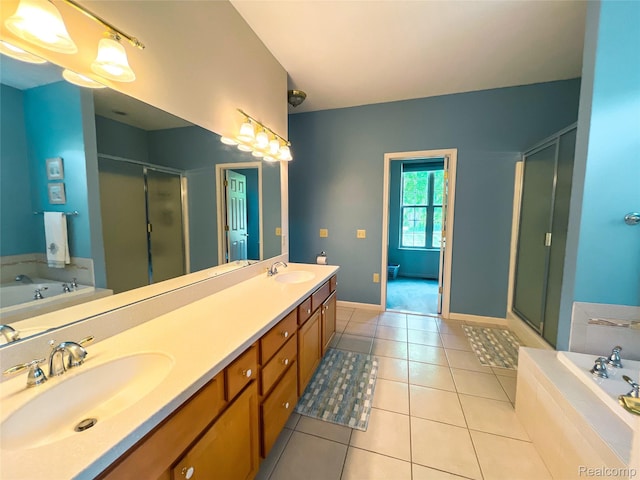 5580 Birch Ln, Davisburg, MI 48350 - bathroom with a shower stall, a bath, double vanity, and tile patterned floors