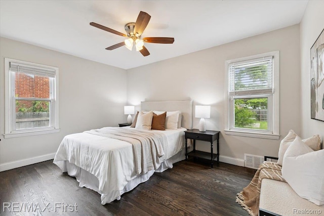 24360 Grove Ave, Eastpointe, MI 48021 - bedroom featuring dark wood-type flooring and a ceiling fan