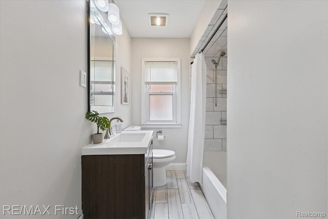 24360 Grove Ave, Eastpointe, MI 48021 - bathroom with vanity and shower / bath combo with shower curtain