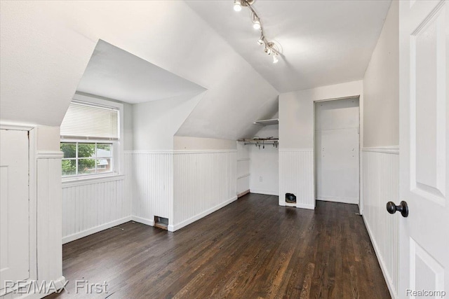 24360 Grove Ave, Eastpointe, MI 48021 - bonus room with a wainscoted wall, wood finished floors, and vaulted ceiling