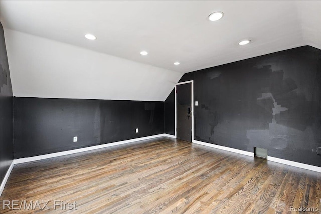 24360 Grove Ave, Eastpointe, MI 48021 - bonus room with lofted ceiling, wood finished floors, and recessed lighting