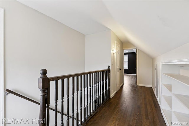24360 Grove Ave, Eastpointe, MI 48021 - hall with an upstairs landing, vaulted ceiling, and wood finished floors