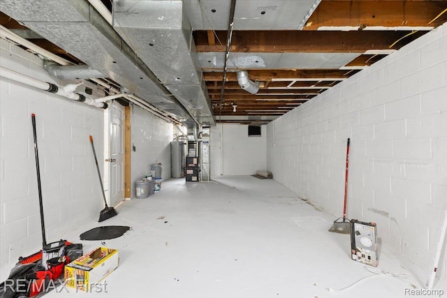 24360 Grove Ave, Eastpointe, MI 48021 - unfinished below grade area with gas water heater and concrete block wall