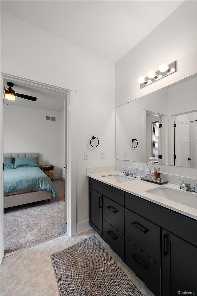 20848 Wexford Dr, Macomb, MI 48044 - ensuite bathroom with double vanity and ceiling fan