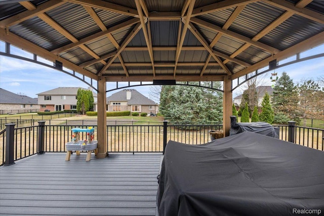 20848 Wexford Dr, Macomb, MI 48044 - wooden terrace with a gazebo, area for grilling, and a residential view