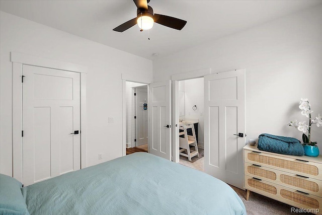 20848 Wexford Dr, Macomb, MI 48044 - carpeted bedroom with a ceiling fan