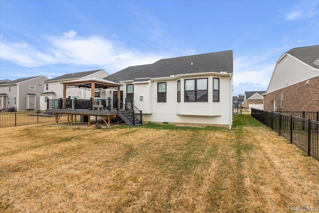 20848 Wexford Dr, Macomb, MI 48044 - back of property with a gazebo, a deck, and a fenced backyard