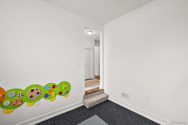20848 Wexford Dr, Macomb, MI 48044 - rec room with baseboards