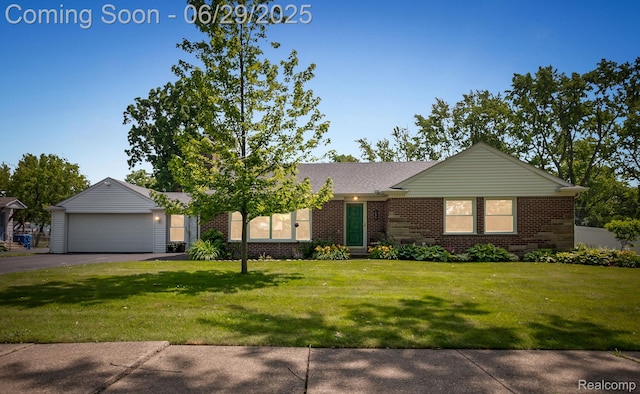 187 Gateway Dr, Waterford, MI 48328 - ranch-style home featuring brick siding, a garage, a front yard, and roof with shingles