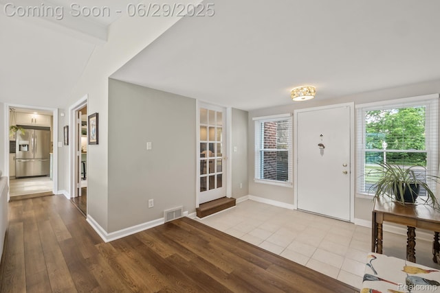 187 Gateway Dr, Waterford, MI 48328 - foyer entrance with wood finished floors and baseboards