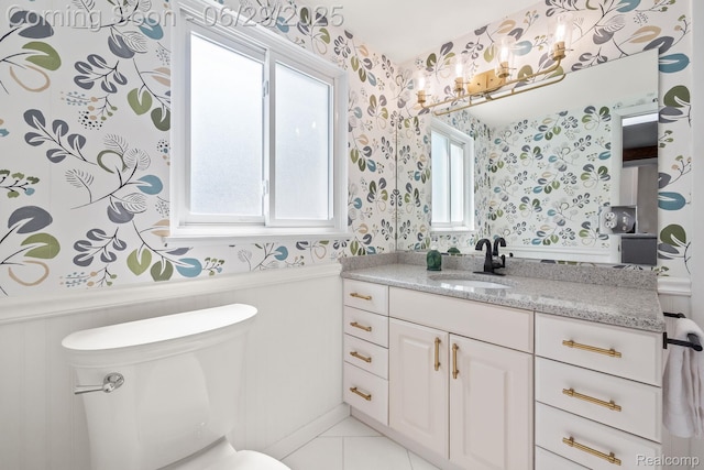 187 Gateway Dr, Waterford, MI 48328 - half bathroom with wallpapered walls, vanity, wainscoting, and tile patterned floors