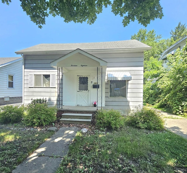 1418 Birney St, Saginaw, MI 48602 - view of front of home featuring roof with shingles