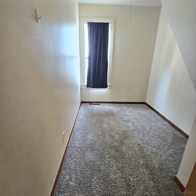 1418 Birney St, Saginaw, MI 48602 - carpeted spare room featuring baseboards