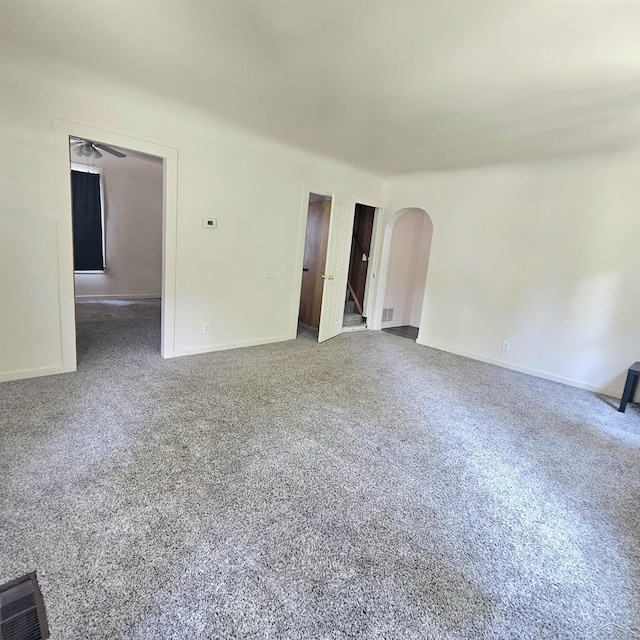 1418 Birney St, Saginaw, MI 48602 - unfurnished living room with arched walkways and carpet flooring