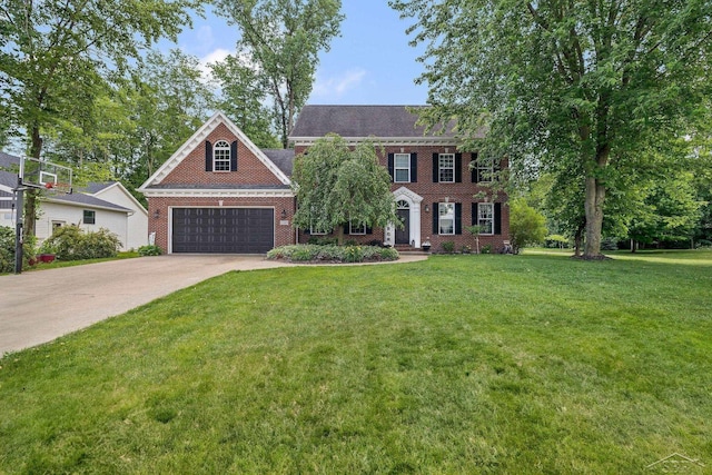 12449 Northway Pkwy, Freeland, MI 48623 - colonial-style house with driveway, a front yard, a garage, and brick siding