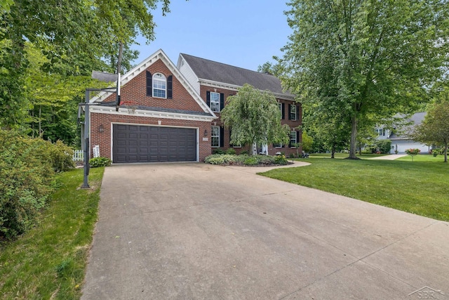 12449 Northway Pkwy, Freeland, MI 48623 - colonial inspired home with brick siding, driveway, and a front yard
